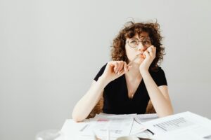 Thoughtful woman learning how pregnancy tests work.